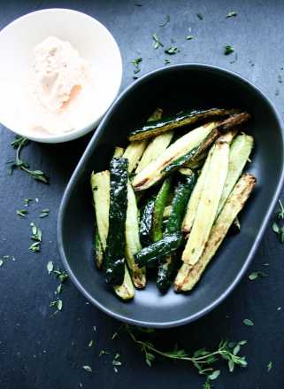 Zucchini fingers with Sriracha cottage cheese dip, Parmesan and thyme