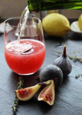 Strain the fig puree, thyme syrup and a bit of sparkling wine- top off with sparkling wine